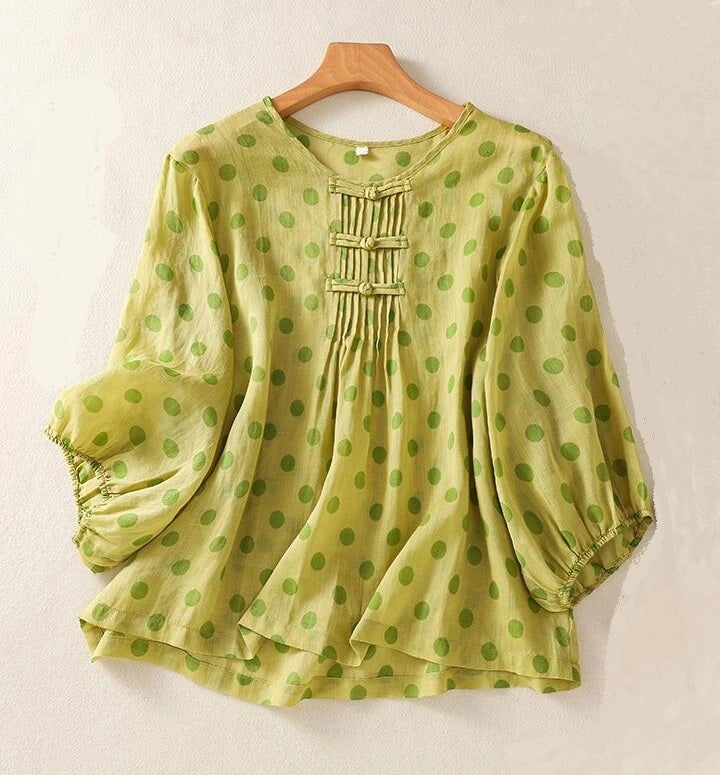 green polka dot top